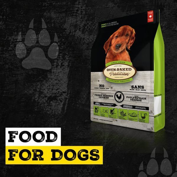 Сухий корм для цуценят Oven-Baked Tradition Puppy All Breed Chicken &mdash; упаковка під кутом на темному фоні