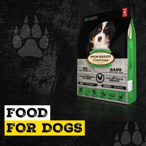 Сухий корм для цуценят Oven-Baked Tradition PUPPY Large Breed Chicken &mdash; упаковка під кутом на темному фоні